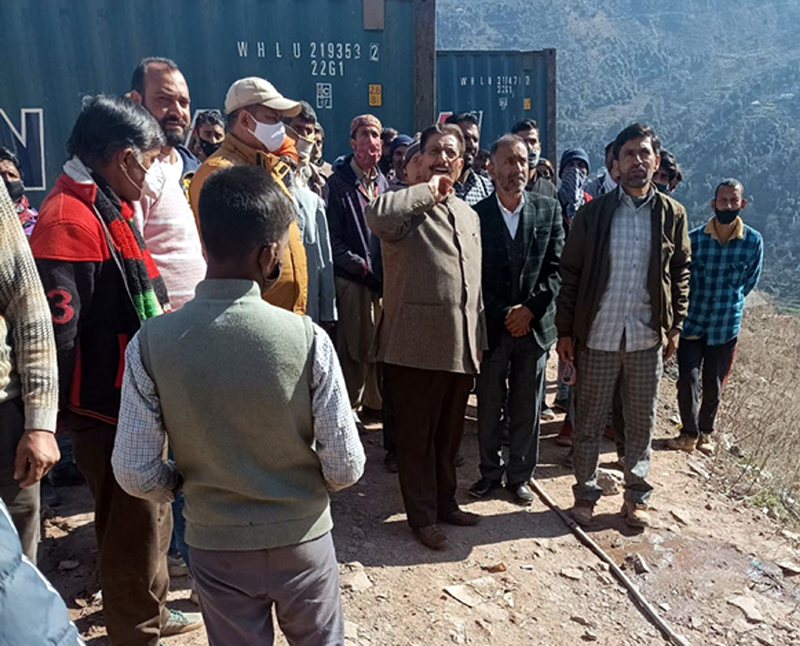Gulchain Singh Charak visiting affected buildings in Ramban.