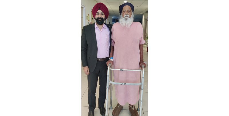 Dr. Ranjit Singh posing for a photograph with 90 years old Beant Singh Grewal after performing a successful surgery. Dr. Ranjit Singh posing for a photograph with 90 years old Beant Singh Grewal after performing a successful surgery.