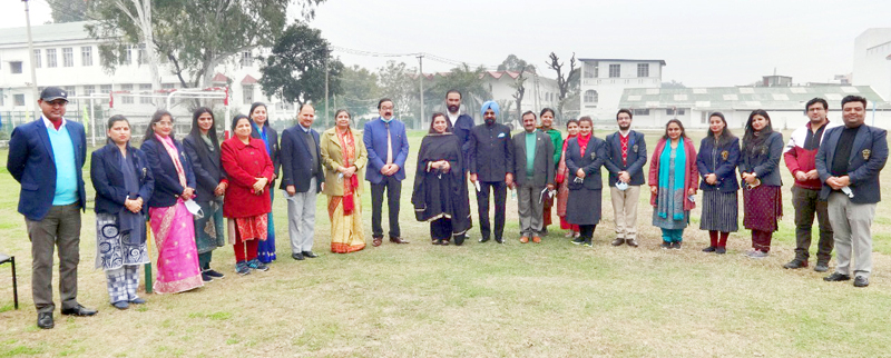 Frontline educators of DPS Jammu posing with the management at the school playground.