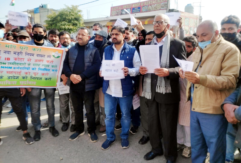 page8 Congress leader Satish Sharma along with others staging protest outside SDM Office Khour on Monday.