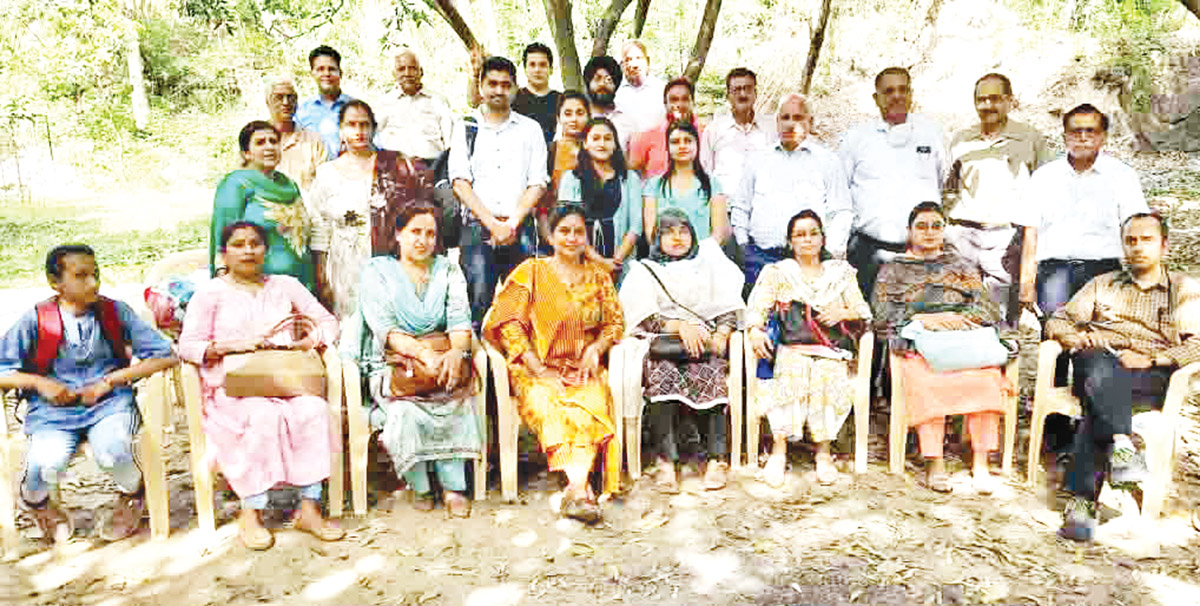 Doctors and staff posing for photograph after medical camp. Doctors and staff posing for photograph after medical camp.