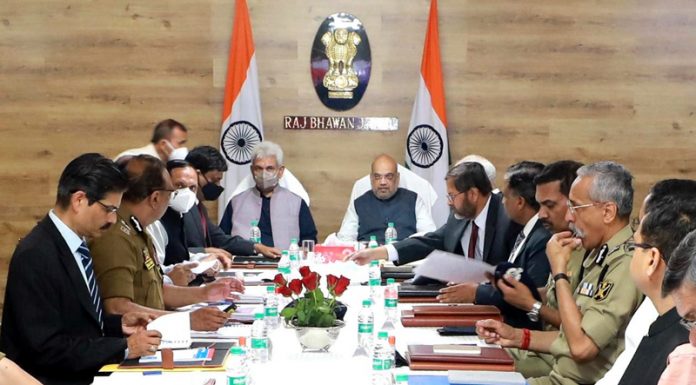 Home Minister Amit Shah chairing security review meeting in Jammu on Saturday.