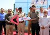 DGP Dilbag Singh handing over a key of motorcycle to a police official of a patrolling team in Jammu on Tuesday.