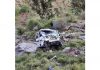 Wreckage of car in the gorge after accident near Ramnagar on Thursday. -Excelsior/K. Kumar