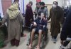 A civilian injured in grenade attack being shifted to SMHS hospital in Srinagar. — Excelsior/Shakeel