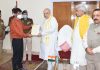 Union Home Minister Amit Shah handing over appointment letter to a kin of JKP martyr.