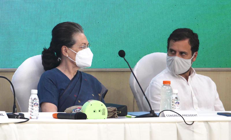 Congress president Sonia Gandhi and party leader Rahul Gandhi during CWC meeting in New Delhi on Sunday. (UNI)