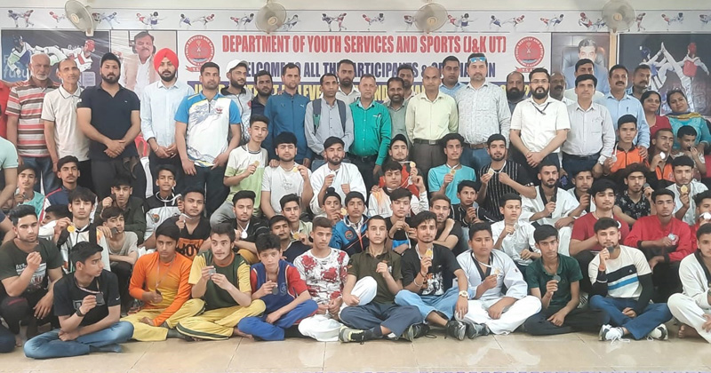Winners posing for a group photograph alongwith dignitaries at Khel Gaon Nagrota on Monday. Winners posing for a group photograph alongwith dignitaries at Khel Gaon Nagrota on Monday.