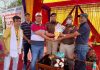 Chief guest SDPO Varun Jandial being presented a bouquet by the organisers at Gharota on Sunday.