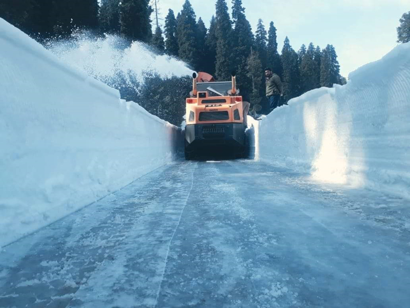 A machine clearing snow from Mughal Road ahead of Behramgalla on Poonch side. — Excelsior/ Ramesh Bali A machine clearing snow from Mughal Road ahead of Behramgalla on Poonch side. — Excelsior/ Ramesh Bali