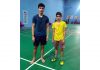 Players posing for a photograph at Badminton court in MA Stadium Jammu.