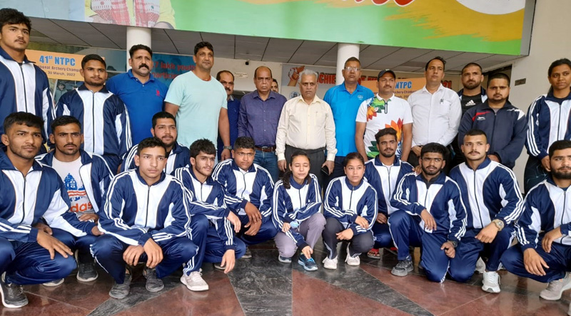 Wrestlers posing for a group photograph with Ashok Singh, Divisional Sports Officer (J) and others at Jammu.