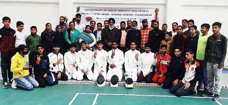 page12-3 Winners posing for a group photograph with dignitaries at Reasi on Wednesday.