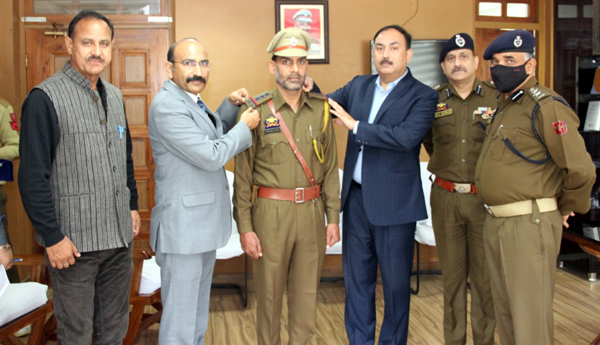 ADGP Dr SD Singh pinning new rank to SI Mahmood Ahmed. ADGP Dr SD Singh pinning new rank to SI Mahmood Ahmed.