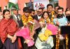 Secretary Sports Council Nuzhat Gul posing for photograph with Bronze medalists of Asian Fencing Championship at Jammu on Friday.