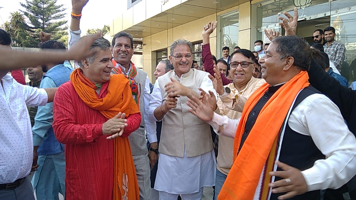 BJP leaders celebrating victory of party in Assembly elections in four states at Jammu on Thursday.
