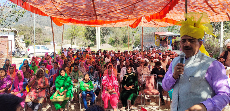 MP Jugal Kishore Sharma addressing a meeting at village Churta in Dansal.