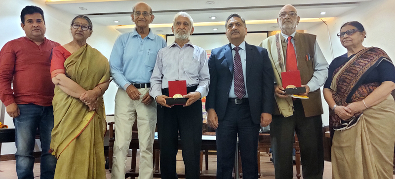 Om Goswami and Dhian Singh being conferred with Dinu Bhai Pant Lifetime Achievements Awards on Saturday. Om Goswami and Dhian Singh being conferred with Dinu Bhai Pant Lifetime Achievements Awards on Saturday.