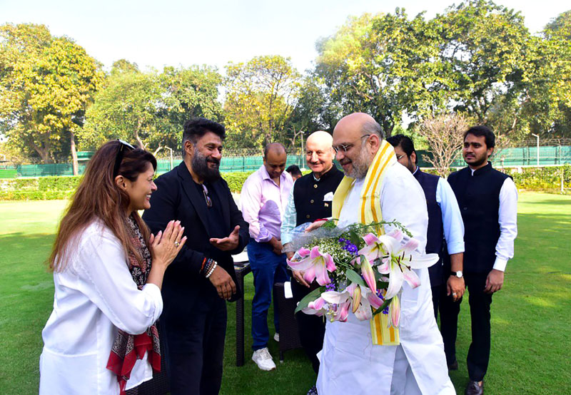 Producer and Director Vivek Ranjan Agnihotri with team of movie 'The Kashmir Files' meeting Union Home Minister Amit Shah, in New Delhi on Wednesday. (UNI)