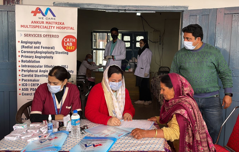 A doctor prescribing medicines to a patient during a health checkup camp at Gurudwara Ashram Digiana in Jammu. A doctor prescribing medicines to a patient during a health checkup camp at Gurudwara Ashram Digiana in Jammu.