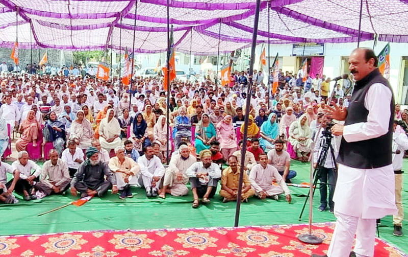 BJP leader, Surjeet Singh Slathia addressing a gathering at Ramnagar on Wednesday.