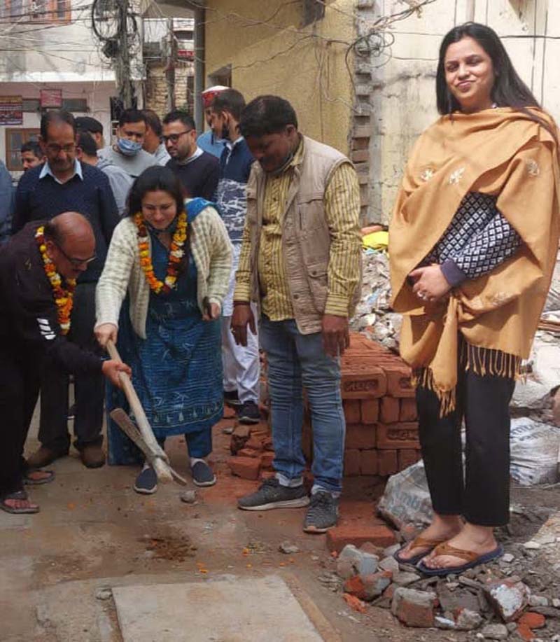 JMC Councillor, Anu Bali starting lane and drain work in Rehari Colony on Tuesday. JMC Councillor, Anu Bali starting lane and drain work in Rehari Colony on Tuesday.