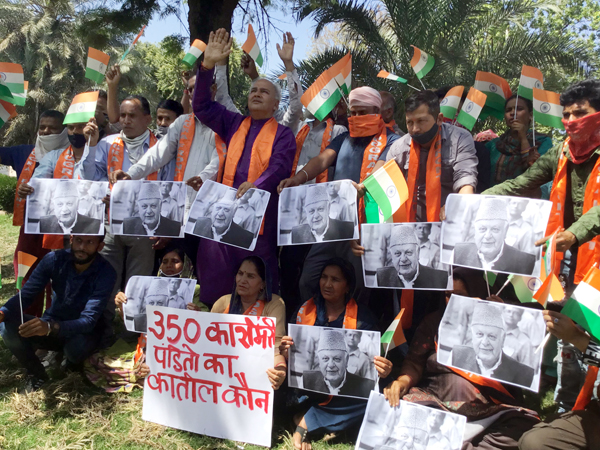 Workers of Dogra Front & Shiv Sena raising slogans during a protest in Jammu on Saturday. Workers of Dogra Front & Shiv Sena raising slogans during a protest in Jammu on Saturday.