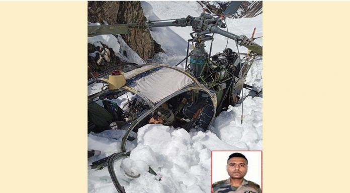 Wreckage of helicopter that crashed in Gurez on Friday. (Inset) Maj Sankalp Yadav.