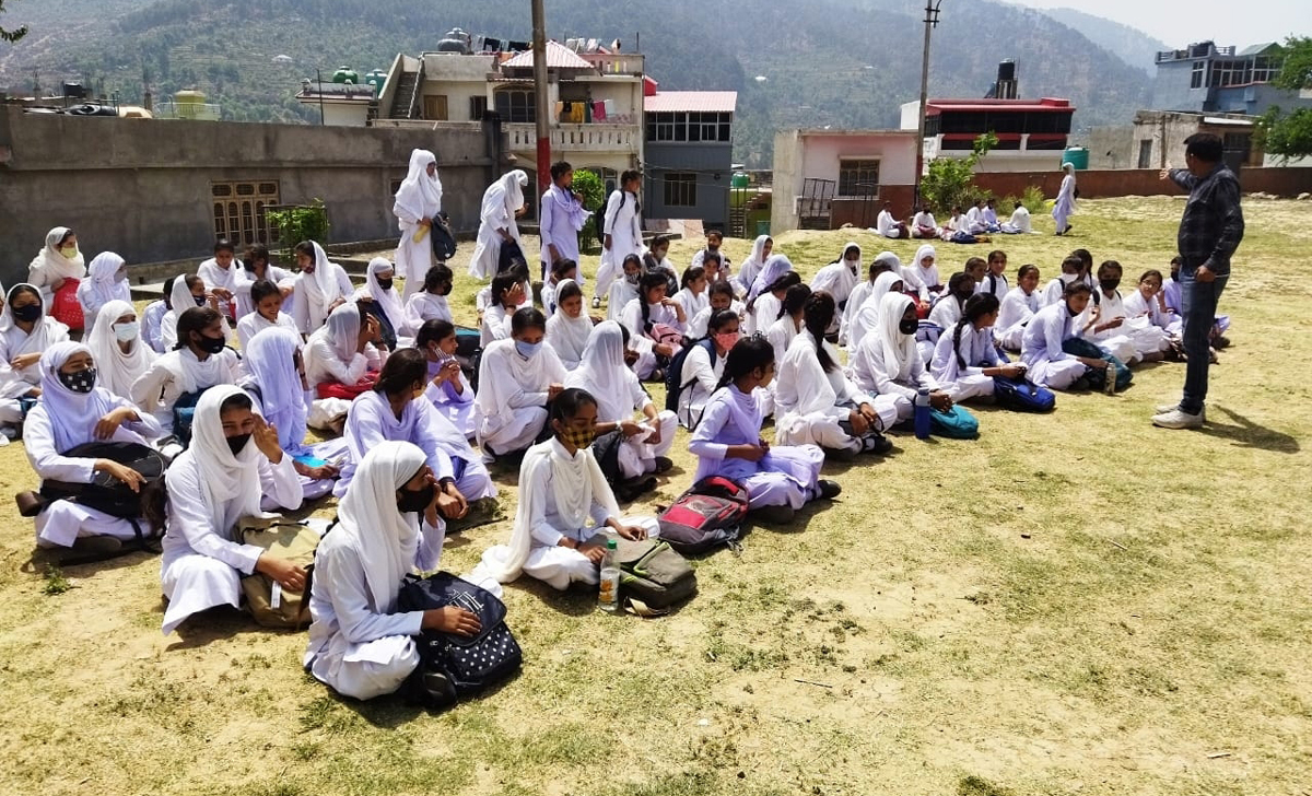 Students taking class in open as HSS Chenani has no adequate classrooms. Students taking class in open as HSS Chenani has no adequate classrooms.
