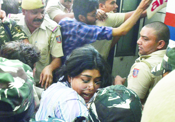 Police detained take to AISA activists a protest at Police Headquarters in New Delhi on Monday. (UNI) Police detained take to AISA activists a protest at Police Headquarters in New Delhi on Monday. (UNI)