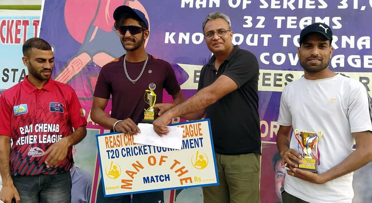 A player being presented with man of the match award by a dignitary at Reasi on Tuesday. — Excelsior / Romesh Mengi A player being presented with man of the match award by a dignitary at Reasi on Tuesday. — Excelsior / Romesh Mengi