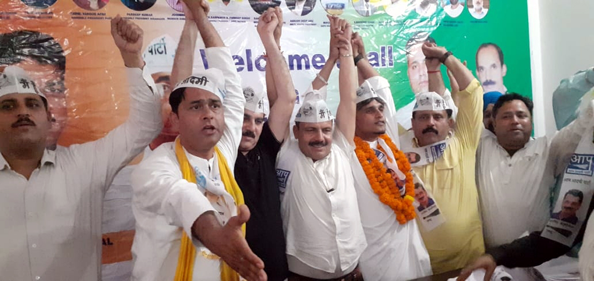 AAP leaders posing together during a meeting at Kathua. AAP leaders posing together during a meeting at Kathua.