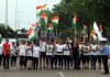 Runners holding off Tricolour during run at Balidan Stambh Jammu on Friday.