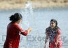 Women enjoy in Tawi river on a hot day in Jammu on Friday. —Excelsior/Rakesh