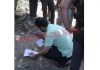 Experts examine the IED at Sidhra Bypass on Thursday. -Excelsior/Rakesh