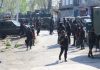 Security forces near encounter site in Shopian on Friday. —Excelsior/Younis Khaliq