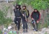 Security forces near encounter site at Mitrigam in Pulwama on Wednesday. -Excelsior/Younis Khaliq