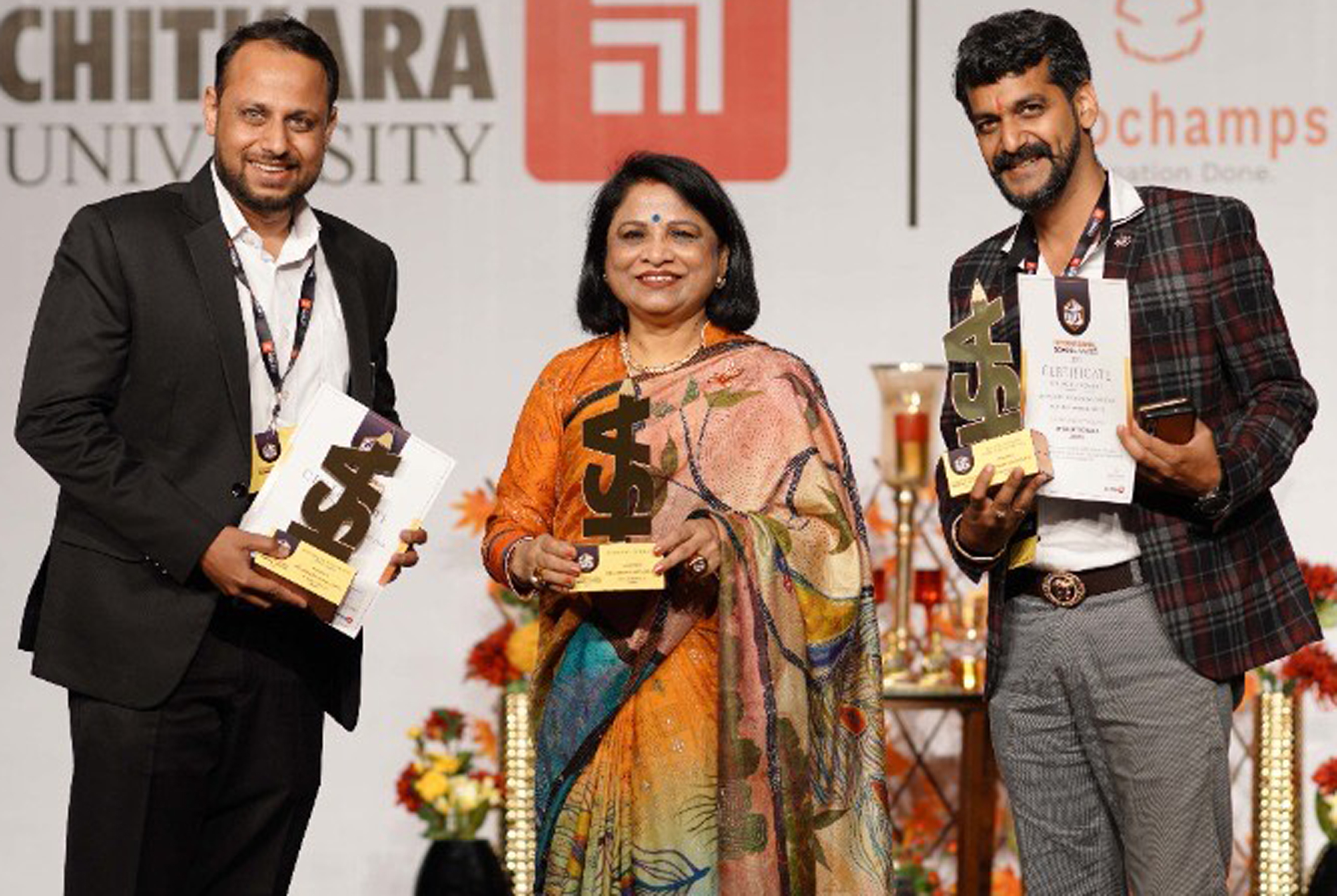 Officials displaying trophies during the award ceremony at Chandigarh. Officials displaying trophies during the award ceremony at Chandigarh.