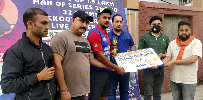 A player being awarded with man of the match by dignitaries at Reasi. A player being awarded with man of the match by dignitaries at Reasi.
