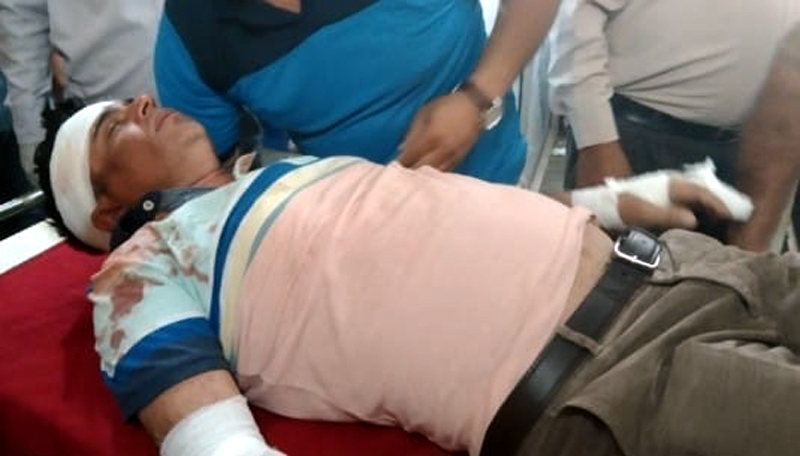 Tehsildar Sunderbani, Ravi Shanker injured in attack undergoing treatment at hospital on Wednesday. Tehsildar Sunderbani, Ravi Shanker injured in attack undergoing treatment at hospital on Wednesday.