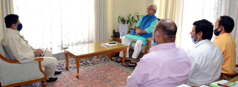 Lt Governor and former Minister during a meeting.