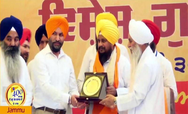 People being honoured by Jathedar Giani Harpreet Singh and Mahant Manjit Singh during a religious function in Jammu on Wednesday. People being honoured by Jathedar Giani Harpreet Singh and Mahant Manjit Singh during a religious function in Jammu on Wednesday.