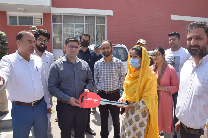 DC Rajouri handing over vehicle to a beneficiary. DC Rajouri handing over vehicle to a beneficiary.
