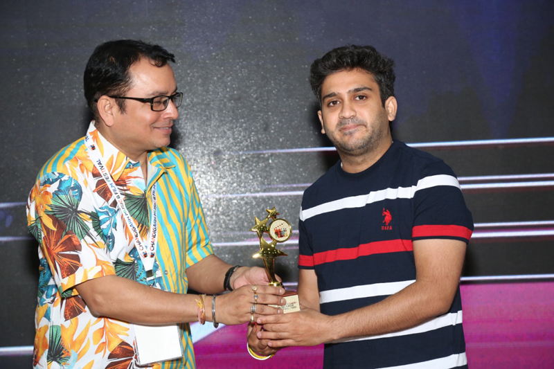 Indu Shekhar receiving award from a dignitary at Chandigarh. Indu Shekhar receiving award from a dignitary at Chandigarh.