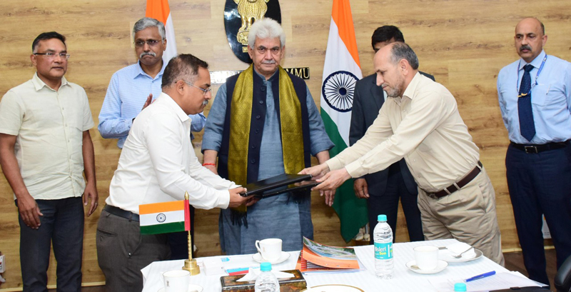 Regional Officer NHAI, J&K and Development Commissioner Works exchanging copies of MoU in presence of Lt. Governor Manoj Sinah on Saturday. Regional Officer NHAI, J&K and Development Commissioner Works exchanging copies of MoU in presence of Lt. Governor Manoj Sinah on Saturday.