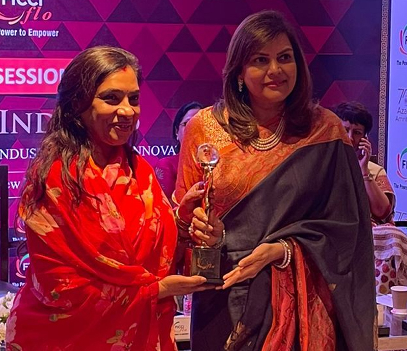Ritu Singh receiving a memento from Ujjwala Singhania, National president of FICCI FLO at New Delhi. Ritu Singh receiving a memento from Ujjwala Singhania, National president of FICCI FLO at New Delhi.