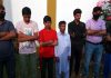 Three teenagers who were brought back from LoC in Sopore on Tuesday. - Excelsior/Abid Nabi