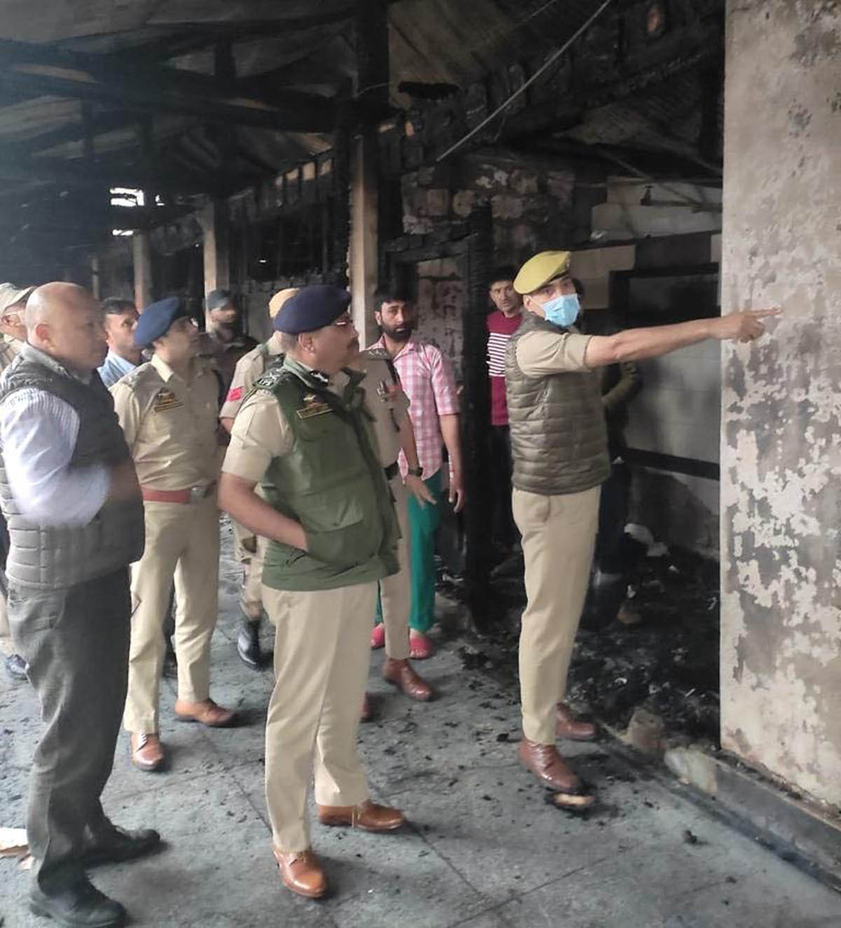 DGP Dilbag Singh taking stock of damages due to fire incident. DGP Dilbag Singh taking stock of damages due to fire incident.