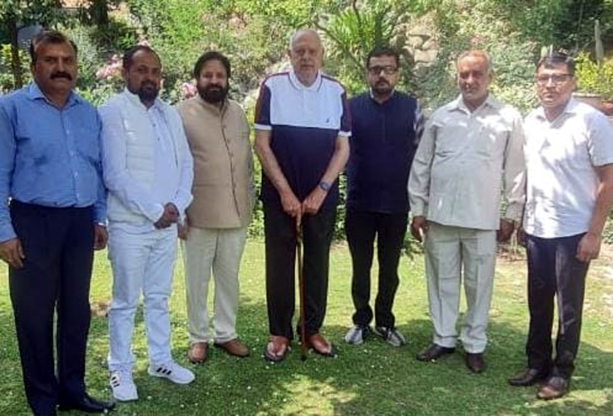 A delegation of NC posing for a group photograph with former CM, Dr. Farooq Abdullah at Srinagar. A delegation of NC posing for a group photograph with former CM, Dr. Farooq Abdullah at Srinagar.