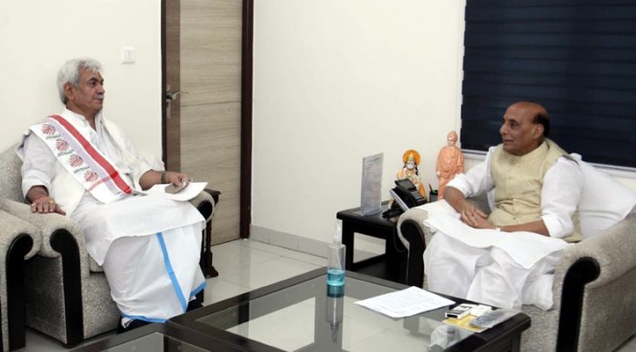 Lieutenant Governor Manoj Sinha in a meeting with Defence Minister Rajnath Singh in New Delhi on Monday.